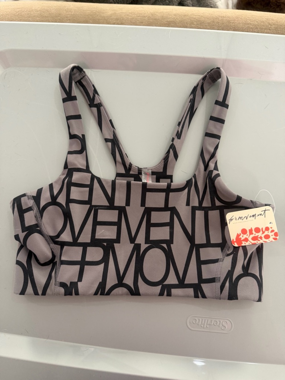 Free people movement Xs nwt Mauve Sports Bra with Black Graphic Text